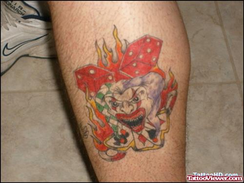Flaming Dice And Joker Face Tattoo