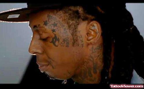 Lil Wayne Stars And Tribal Face Tattoo