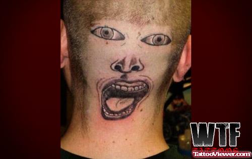 Grey Ink Funny Face Tattoo On BAck Head