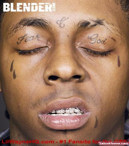 Lil Wayne Tear Drops Face Tattoo