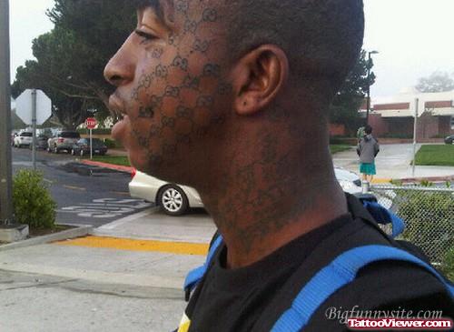 Attractive Black Ink Face Tattoo For Men