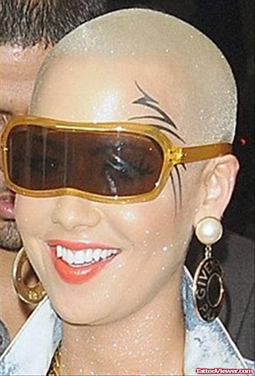 Amber Rose With Tribal Face Tattoo