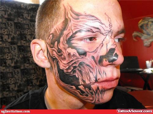 Guy With Grey Ink Face Tattoo