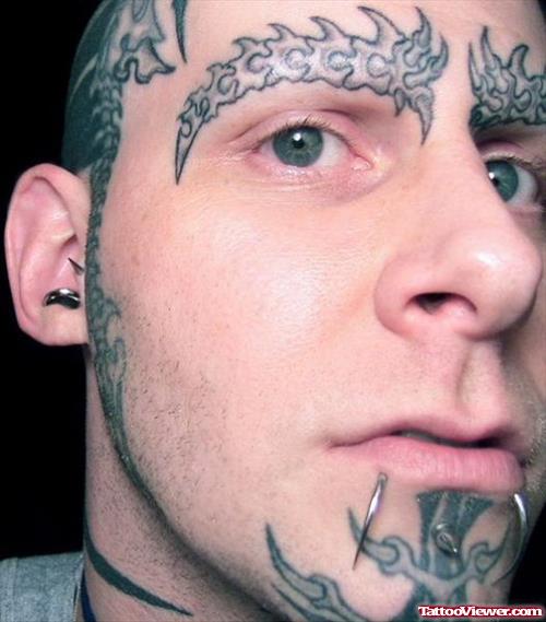 Grey Ink Tribal Face Tattoos For Men