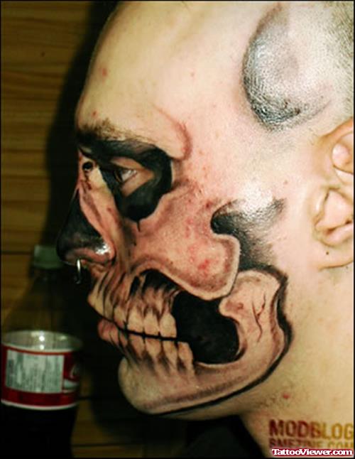Grey Ink Skull Face Tattoo