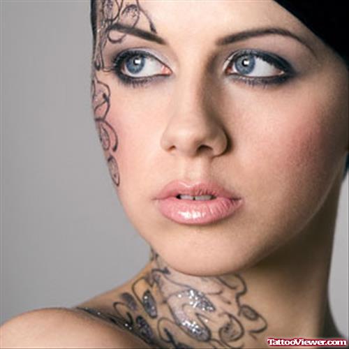 Girl With Neck And Face Tattoo