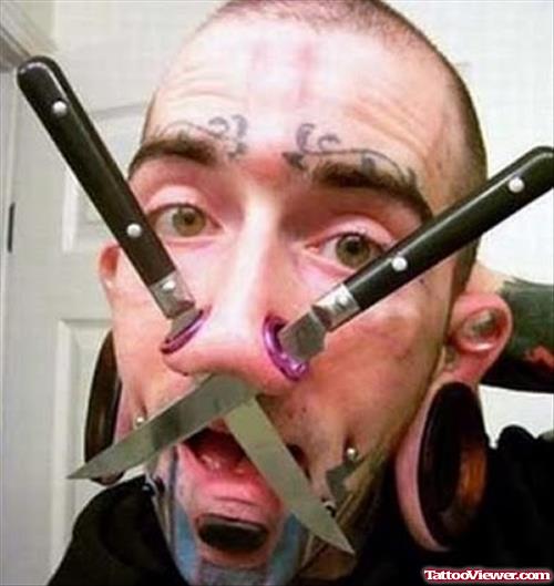 Extreme Tribal Face Tattoos For Men