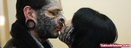 Couple With Face Tattoo