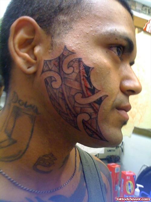 Beautiful Grey Ink Tribal Face Tattoo