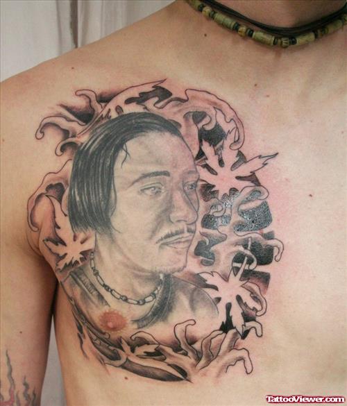 Asian Face Tattoo On Man Chest