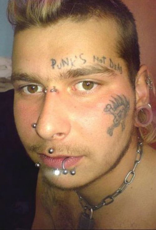 PunkвЂ™s Not Dead And Pirate Skull Tattoo On Face
