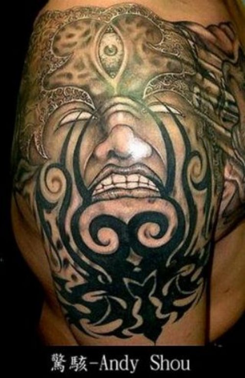 Tribal Girl Face Tattoo On Shoulder