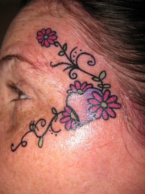 Color Flowers And Heart Face Tattoo For Girls