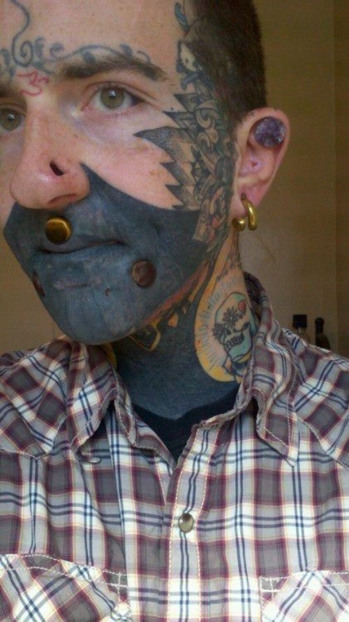 Dark Ink Face Tattoo For Men