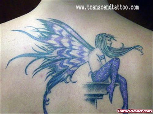 Purple Ink Fairy Tattoo On Back