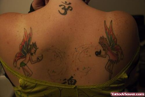 Om Symbol And Fairy Tattoos On Back