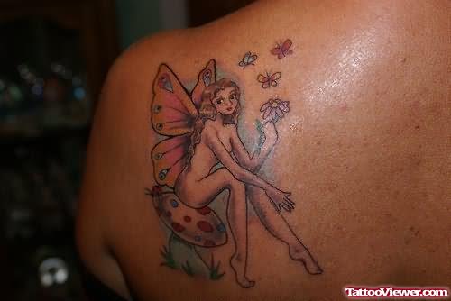 Mushroom And Fairy Tattoo On Left Back Shoulder