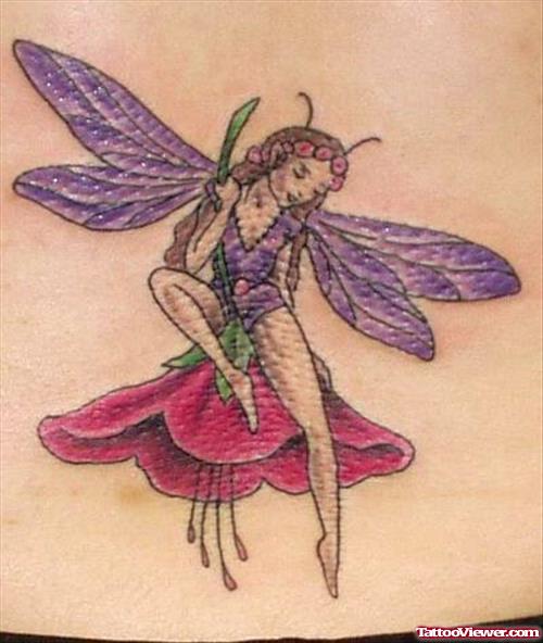 Fairy With Ewd Flower Tattoo