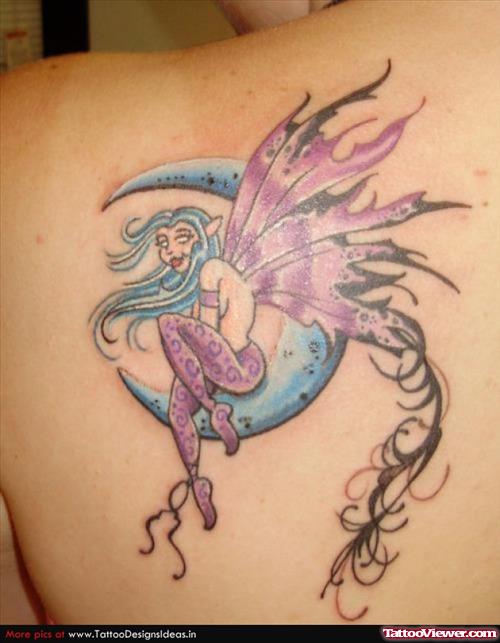 Attractive Blue Ink Moon And Fairy Tattoo On Left Back Shoulder