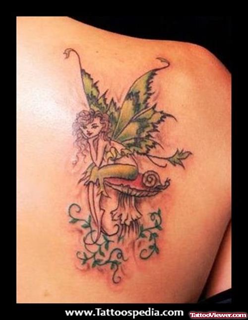 Colored Fairy Tattoo On Right Back Shoulder