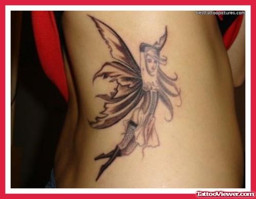 Grey Ink Fairy Tattoo On Side Rib