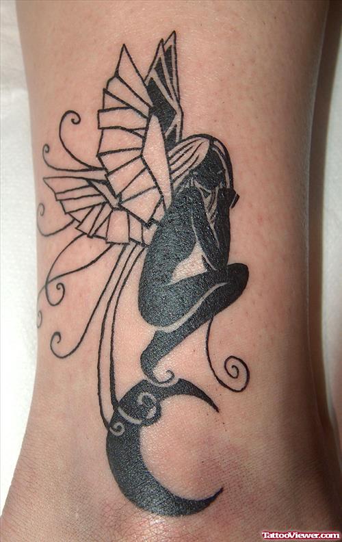 Black Ink Moon And Fairy Tattoo On Leg