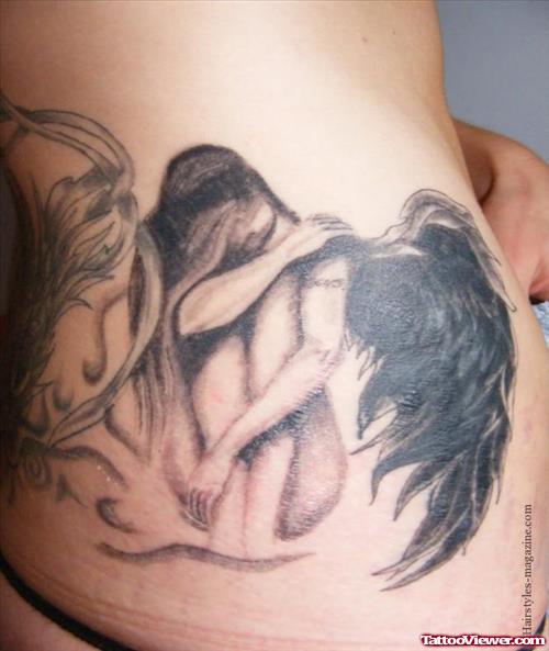 Grey Ink Crying Fairy Tattoo On Rib Side