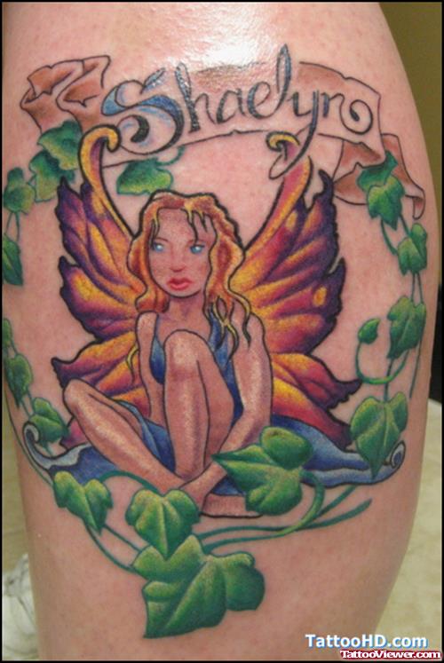 Banner And Fairy Tattoo On Leg