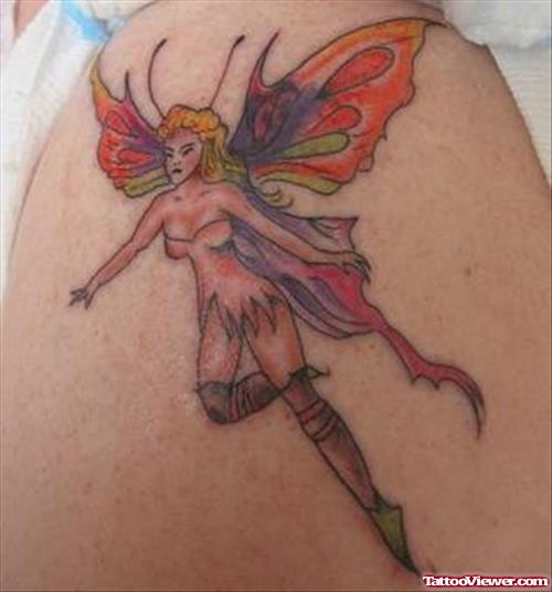 Colored Ink Flying Fairy Tattoo On Shoulder