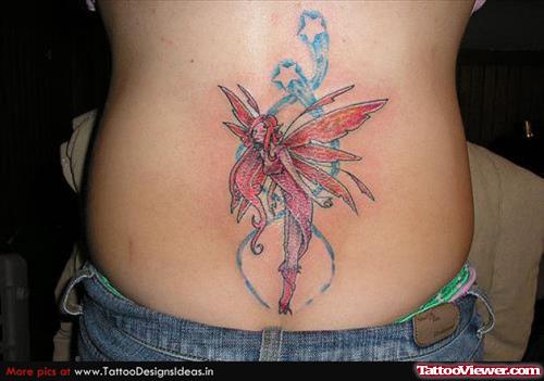 Twinkling Blue Stars And Fairy Tattoo On Back