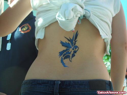 Blue Ink Fairy Tattoo