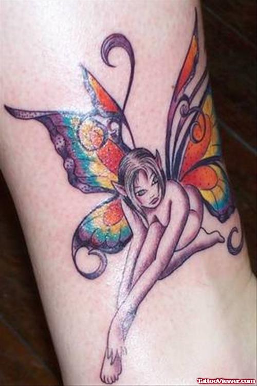 Awesome Colored Fairy Leg Tattoo