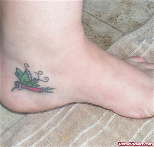 Small Colored Fairy Tattoo On Heel