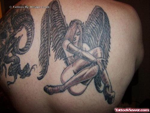 Grey Ink Angel Winged Fairy Tattoo On Back