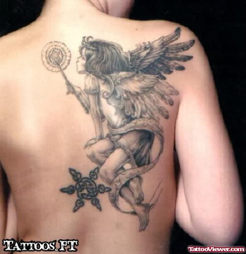 Fairy With Dandelion Puff Tattoo