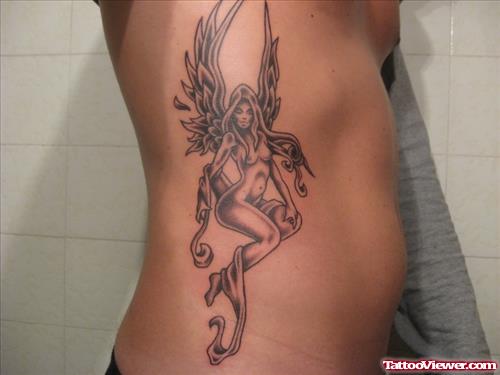 Grey Ink Rib Side Fairy Tattoo