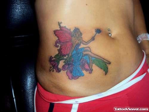 Colored Ink Hip Fairy Tattoo