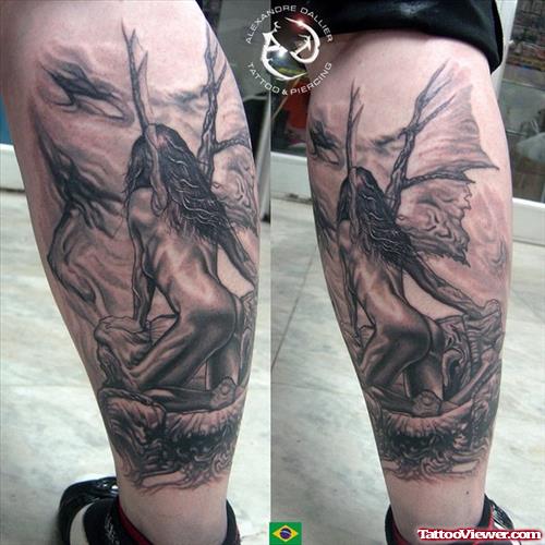 Grey Ink Fairy Tattoo On Back Leg