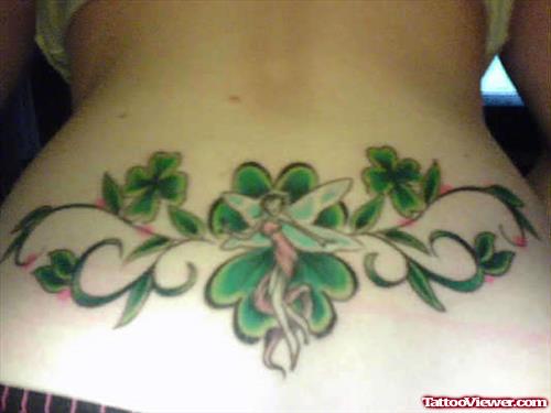 Green Ink Leaves And Fairy Tattoo
