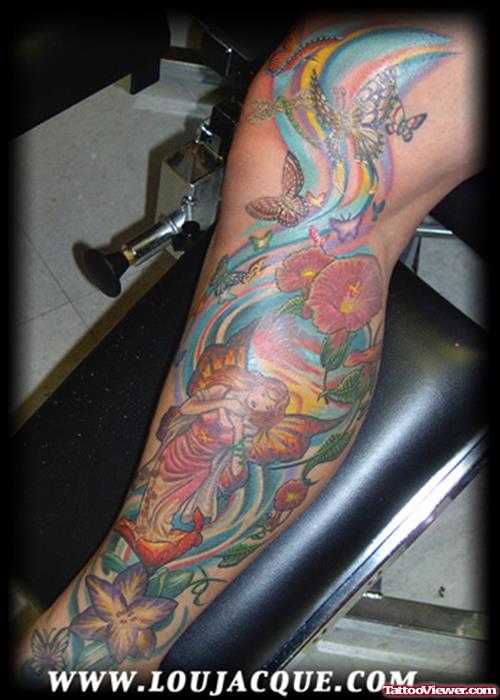 Colored Ink flowers And  Fairy Tattoo On Leg