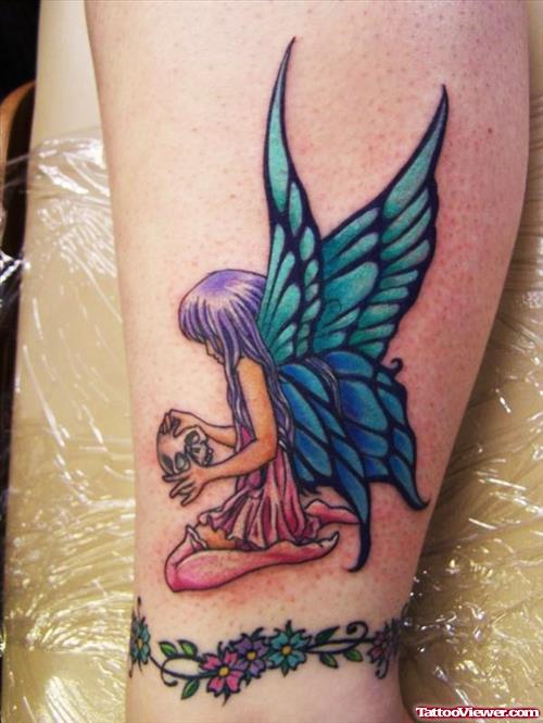 Flowers And Fairy Tattoo On Leg