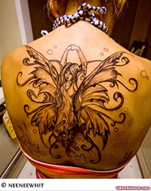 Fairy Tattoo On Girl Upperback