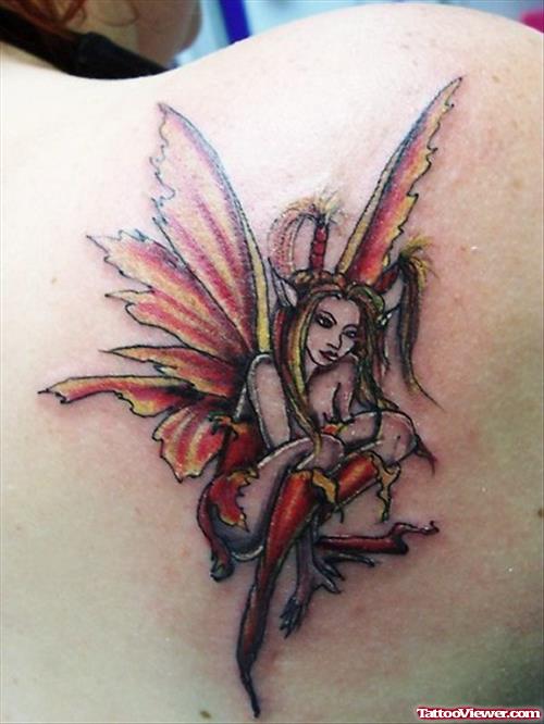 Colored Fairy Tattoo On Back Shoulder