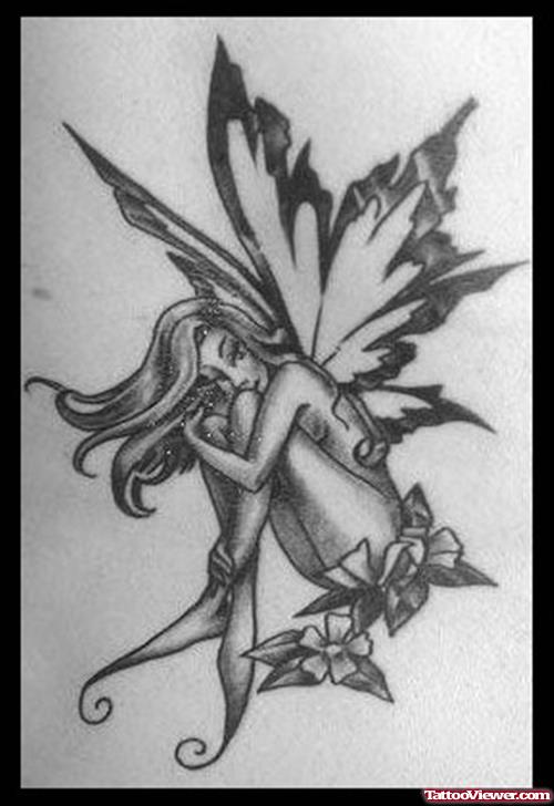 Flowers And Sitting Fairy Tattoo Design