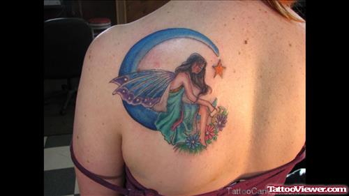 Blue Ink Moon And Fairy Tattoo On Left Back Shoulder