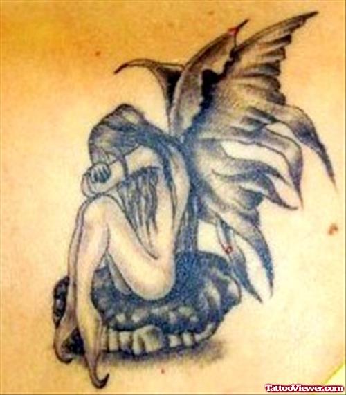 Amazing Grey Ink Sad Fairy Tattoo