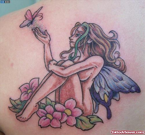 Beautiful Colored Flowers And Fairy Tattoo