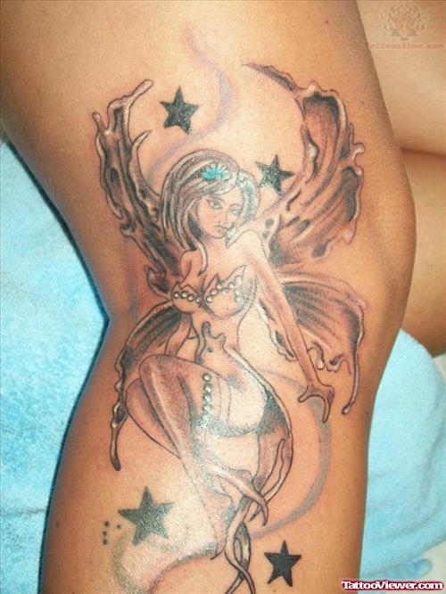 Grey Ink Fairy Tattoo On Leg