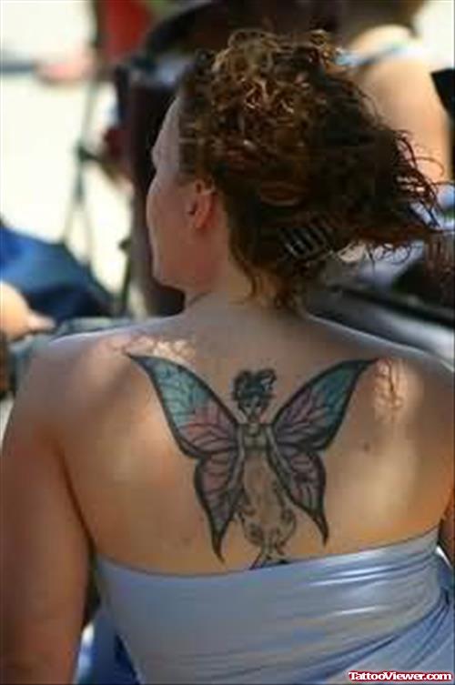 Beautiful Fairy Tattoo On Upper Back