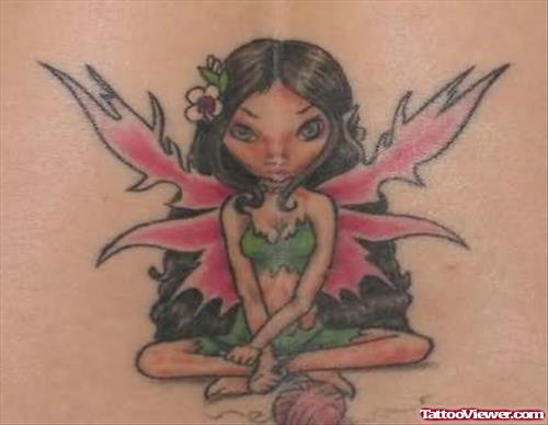 Awesome Fairy Sitting  Tattoo